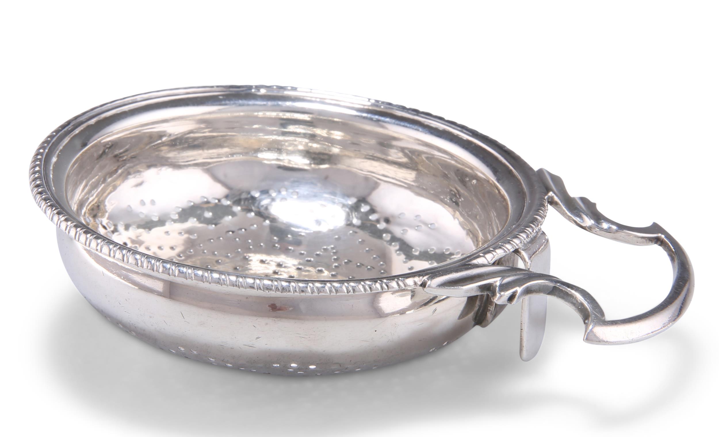 A GEORGE III SILVER LEMON STRAINER