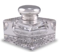 A GEORGE V SILVER-TOPPED CUT-GLASS INKWELL