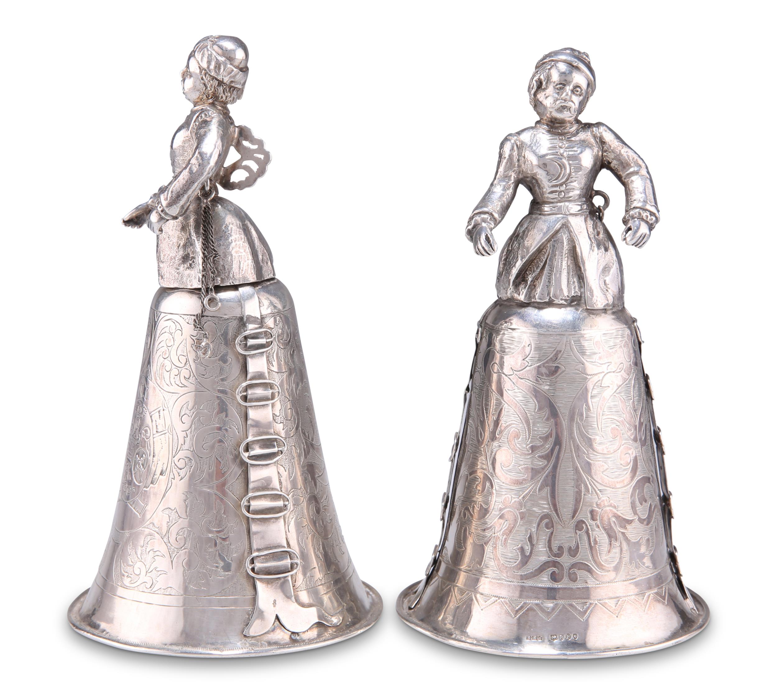 A NEAR PAIR OF 19TH CENTURY DUTCH SILVER MARRIAGE CUPS