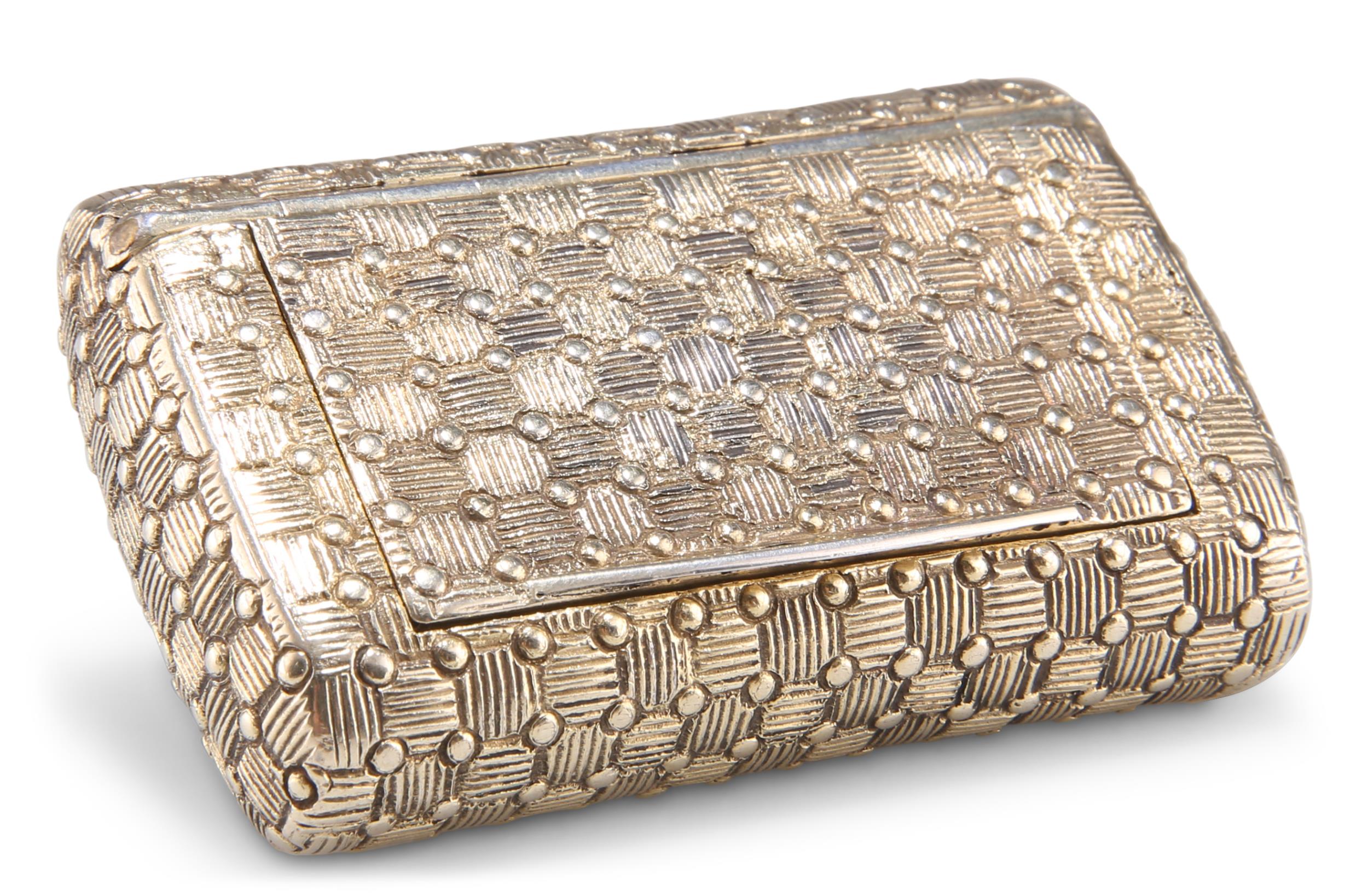 A GEORGE III SILVER-GILT SNUFF BOX