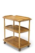 AN ERCOL LIGHT ELM TEA TROLLEY