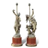 A PAIR OF BRONZE FIGURAL TABLE LAMPS