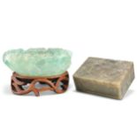 A CHINESE CARVED FLUORITE BOWL AND A CHINESE CARVED SOAPSTONE BOX AND COVER