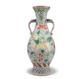 A CHINESE FAMILLE VERTE TWO-HANDLED VASE