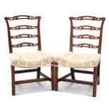 A PAIR OF GEORGE III-STYLE MAHOGANY LADDER-BACK CHAIRS