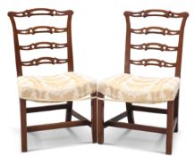 A PAIR OF GEORGE III-STYLE MAHOGANY LADDER-BACK CHAIRS