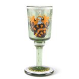 A 19TH CENTURY ARMORIAL GREEN GLASS TOT