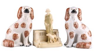 A TURN VIENNA FIGURAL VASE AND A PAIR OF STAFFORDSHIRE SPANIELS