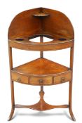 A GEORGE III MAHOGANY CORNER WASHSTAND