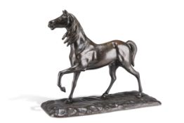 A PATINATED BRONZE MODEL OF A HORSE