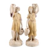 A PAIR OF ROYAL DUX FIGURES