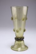 A BOHEMIAN OLIVE GREEN GLASS VASE, CIRCA 1880