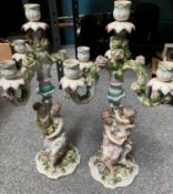 A LARGE PAIR OF HELENA WOLFSOHN PORCELAIN FIGURAL CANDELABRA