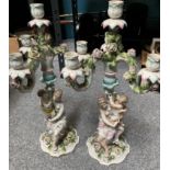 A LARGE PAIR OF HELENA WOLFSOHN PORCELAIN FIGURAL CANDELABRA