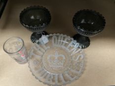 TWO SMOKED GLASS CHALICES AND A COMMEMORATIVE 1837-1887 VICTORIAN PRESSED GLASS PLATE AND MUG
