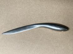 A WHITE METAL LETTER OPENER