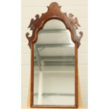 A QUEEN ANNE STYLE WALNUT FRETWORK MIRROR