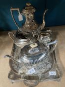 A VICTORIAN/EDWARDIAN SILVER-PLATED FOUR-PIECE TEA SERVICE ON TRAY AND ANOTHER PLATED TRAY