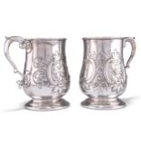 A PAIR OF 19TH CENTURY SILVER-PLATED MUGS