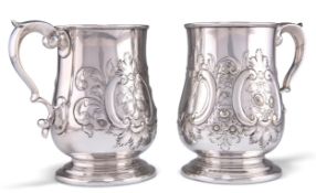 A PAIR OF 19TH CENTURY SILVER-PLATED MUGS