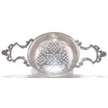A GEORGE II SILVER PUNCH STRAINER