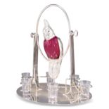 A SILVER-PLATED AND CRANBERRY GLASS NOVELTY DRINKS SET
