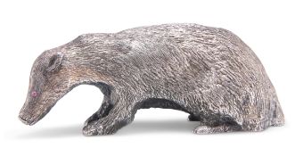 AN ELIZABETH II CAST SILVER MODEL OF A BADGER