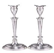 A PAIR OF GEORGE V SILVER CANDLESTICKS