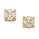 A PAIR OF SOLITAIRE DIAMOND EARRINGS