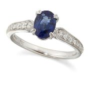 AN 18 CARAT WHITE GOLD SAPPHIRE AND DIAMOND RING