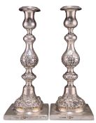 A PAIR OF RUSSIAN SILVER SABBATH CANDLESTICKS