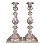 A PAIR OF RUSSIAN SILVER SABBATH CANDLESTICKS