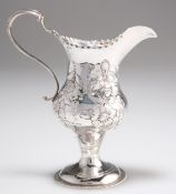 A GEORGE III SILVER CREAM JUG