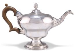 AN EARLY GEORGE III SILVER TEAPOT