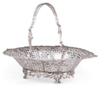 AN EARLY GEORGE III PIERCED SILVER CAKE BASKET