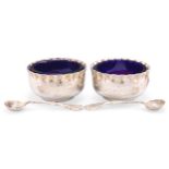 A PAIR OF VICTORIAN SILVER SALTS AND SPOONS