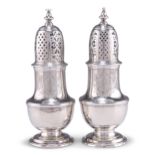 A PAIR OF GEORGE II SILVER PEPPER CASTERS