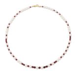 A CULTURED PEARL AND RUBY NECKLACE