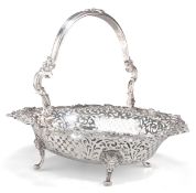 A GEORGE III PIERCED SILVER CAKE BASKET