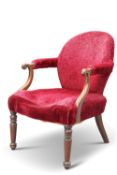 A REGENCY MAHOGANY AND UPHOLSTERED LIBRARY CHAIR, with scroll-form terminals to the arms, raised