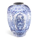 A LARGE 18TH CENTURY DUTCH DELFT BLUE AND WHITE VASE, of ribbed octagonal baluster form, with