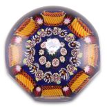 A PAUL YSART MILLEFIORI GLASS PAPERWEIGHT, CIRCA 1930S, octagonal faceted design with concentric