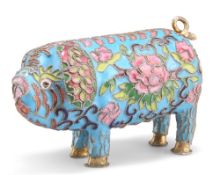 A CHINESE CLOISONNE MODEL OF A PIG, enamel decorated with foliage within raised wirework against a