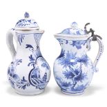 TWO DELFT CRUET JUGS, 19TH CENTURY, each blue painted, one with hinged cover, each with blue painted
