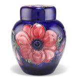 A WALTER MOORCROFT POTTERY GINGER JAR AND COVER,ÿ'Anemone' pattern, tubelined and hand-painted in
