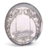 ARCHIBALD KNOX FOR LIBERTY & CO, A TUDRIC PEWTER DISH, no. 0231, circular, cast in low relief with