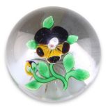 A BACCARAT LAMPWORK PANSY GLASS PAPERWEIGHT, the pansy spray with a central millefiori cane to clear