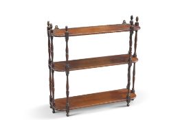 A SET OF 19TH CENTURY CHIPPENDALE-STYLE MAHOGANY HANGING SHELVES, the three shelves with rounded