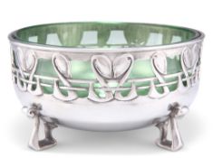 ARCHIBALD KNOX FOR LIBERTY & CO, A TUDRIC PEWTER BOWL, no. 0924,ÿwith cast and pierced stylised