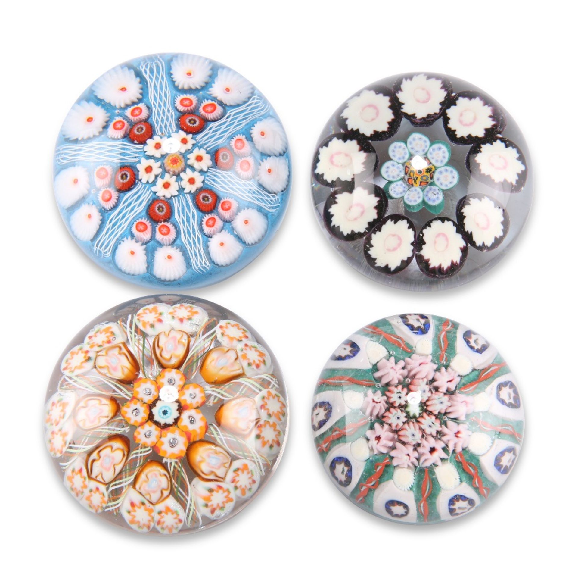 FOUR VARIOUS SCOTTISH GLASS MILLEFIORI PAPERWEIGHTS, each with cane and latticinio decoration. (4)